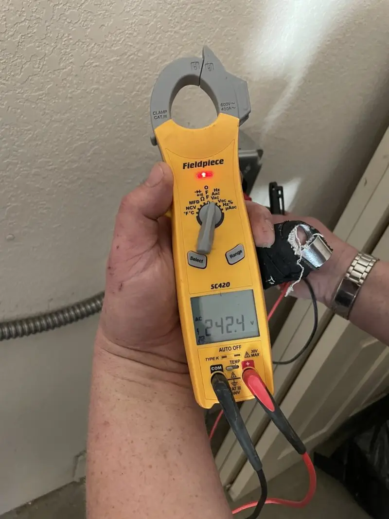 Voltage testing with clamp meter during Whole House Surge Protector in Plaquemine